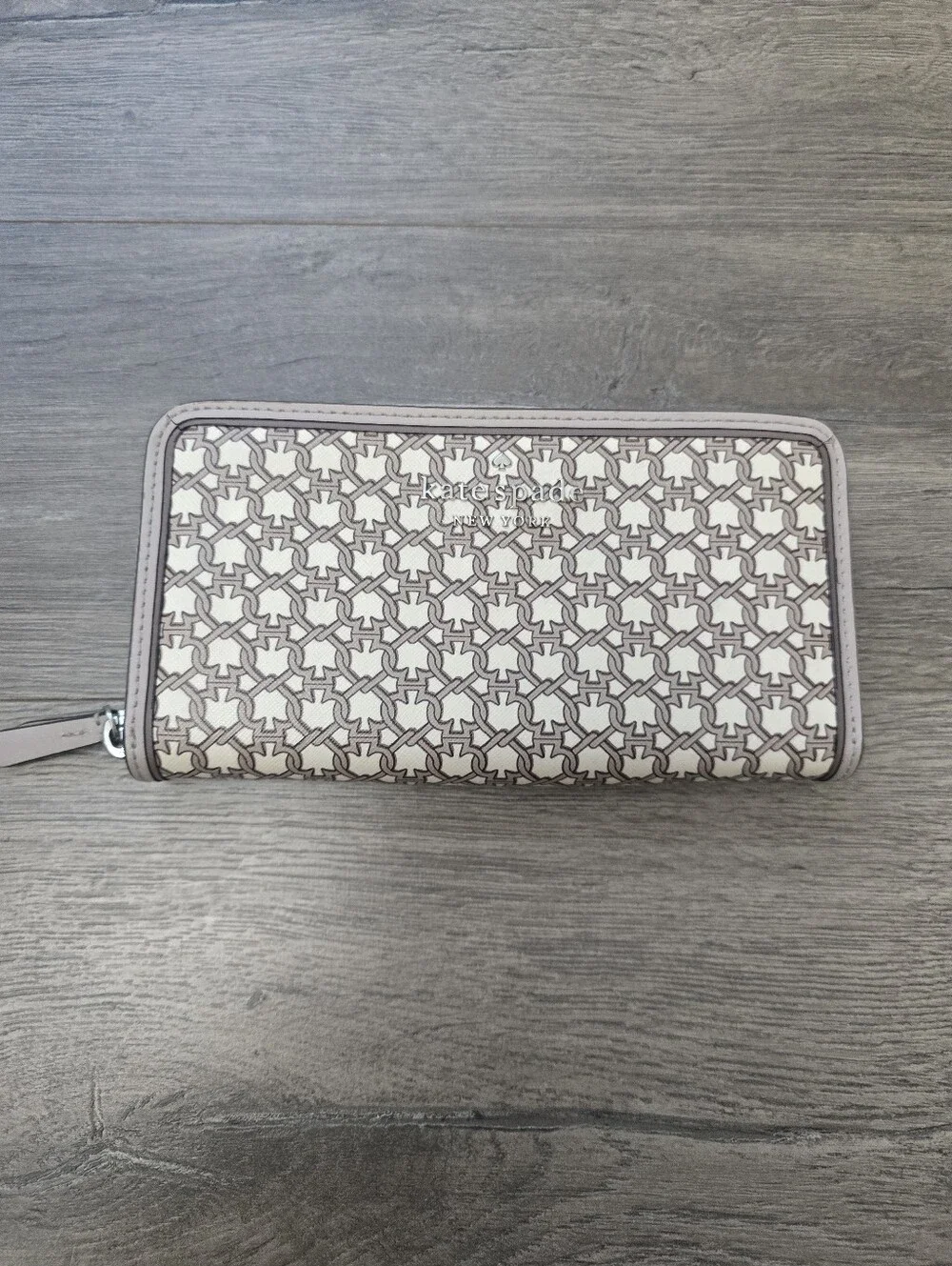 Kate Spade Spade Link Large Continental Wallet in a cream/tan geo pattern